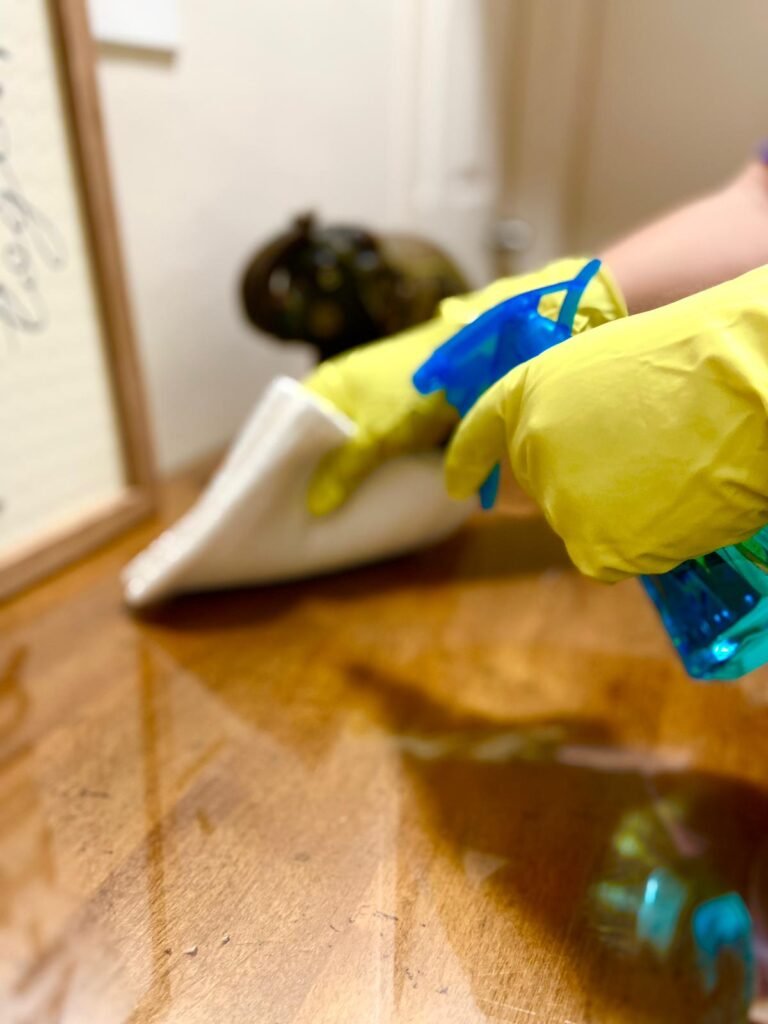 wiping surface with spray bottle